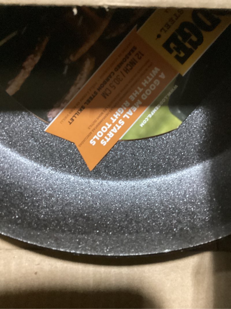 Condition photo showing Good Condition for lodge pre-seasoned carbon steel skillet - use in the oven, on the stove, on the grill, or over a campfire - 12 inch