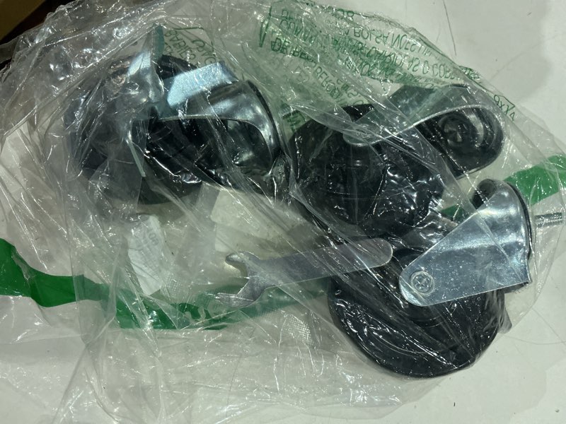 Condition photo showing As Is for caster wheel 