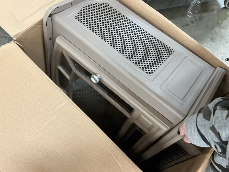 Condition photo showing As Is for Duraflame heater 