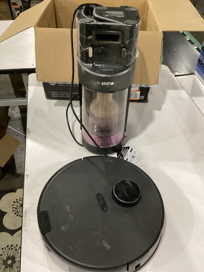 Condition photo showing As Is for eureka e20 robot vacuum with bagless self emptying station, robotic vacuum and mop combo, 45-day capacity, upgraded 8000pa suction and anti hair-tangling brush, lidar navigation, app control black e20