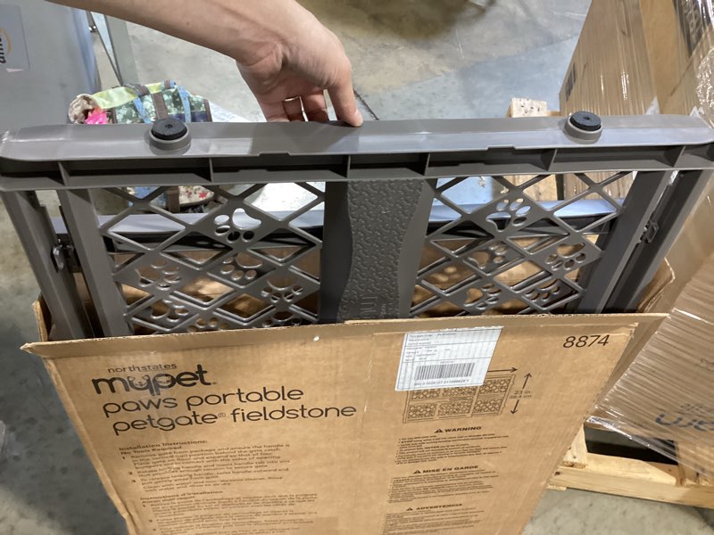 Condition photo showing Good Condition for mypet paws portable pet gate: 26-40" wide expandable, pressure mounted no tools needed, durable dog gate for doorways, made in usa, 23" tall, fieldstone gray