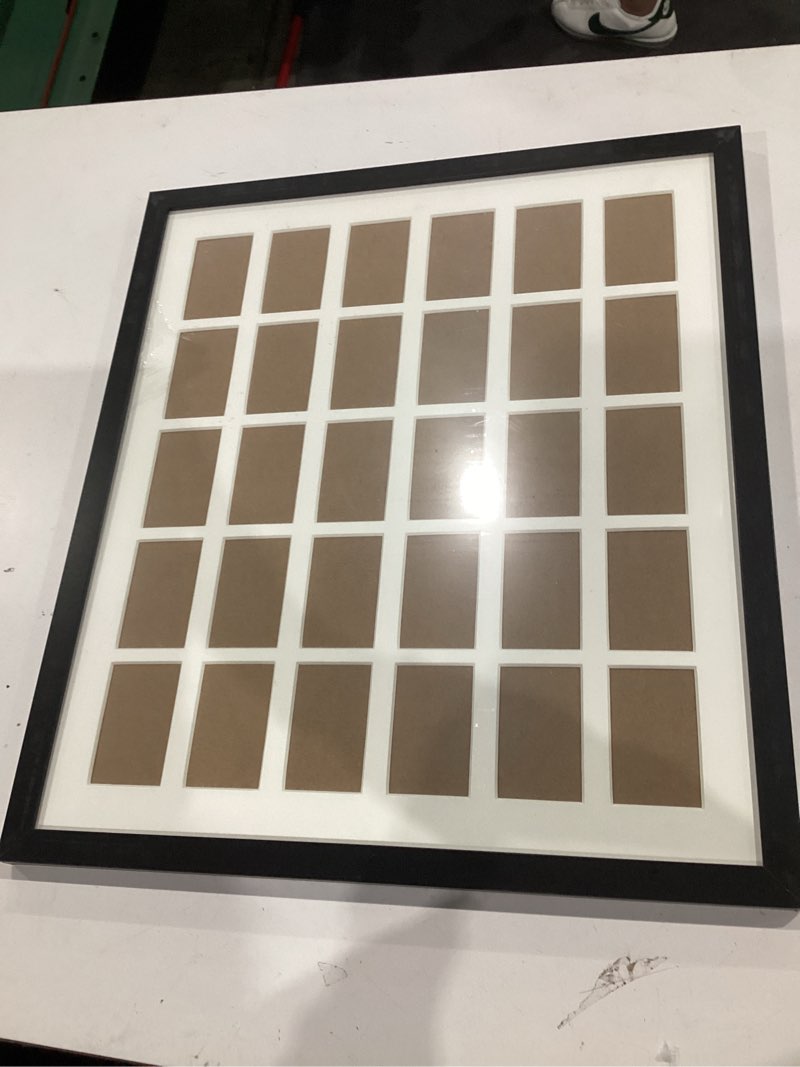 Condition photo showing Good Condition for black multi picture frame collage wall decor for fujifilm instax mini film - 30 openings large photo collage frame for wall - mini picture wall frame - not compatible with polaroid film size black instax mini / 2x3