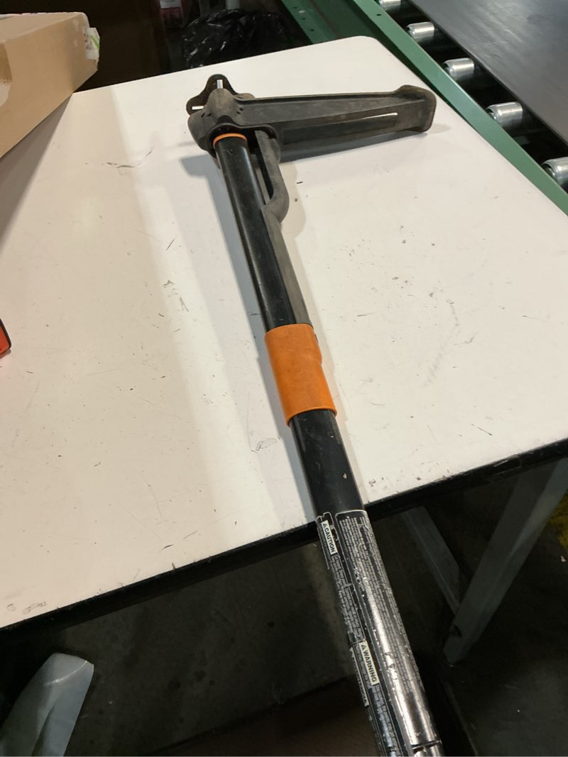 Condition photo showing As Is for fiskars stand-up weed puller tool, 4 serrated stainless steel claws grip roots for permanent removal, reinforced foot platform penetrates tough soil, easy-eject & ergonomic offset handle, 39"