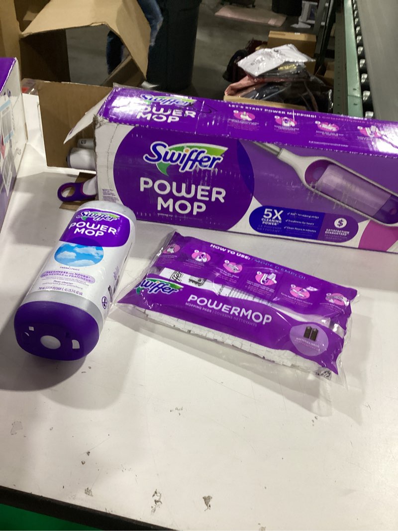 Condition photo showing Good Condition for Swiffer PowerMop Multi-Surface Mop Kit for Floor Cleaning, Includes PowerMop, 2 Mopping Pad Refills, 1 Cleaning Solution with Fresh Scent and 2 Batteries Purple and White