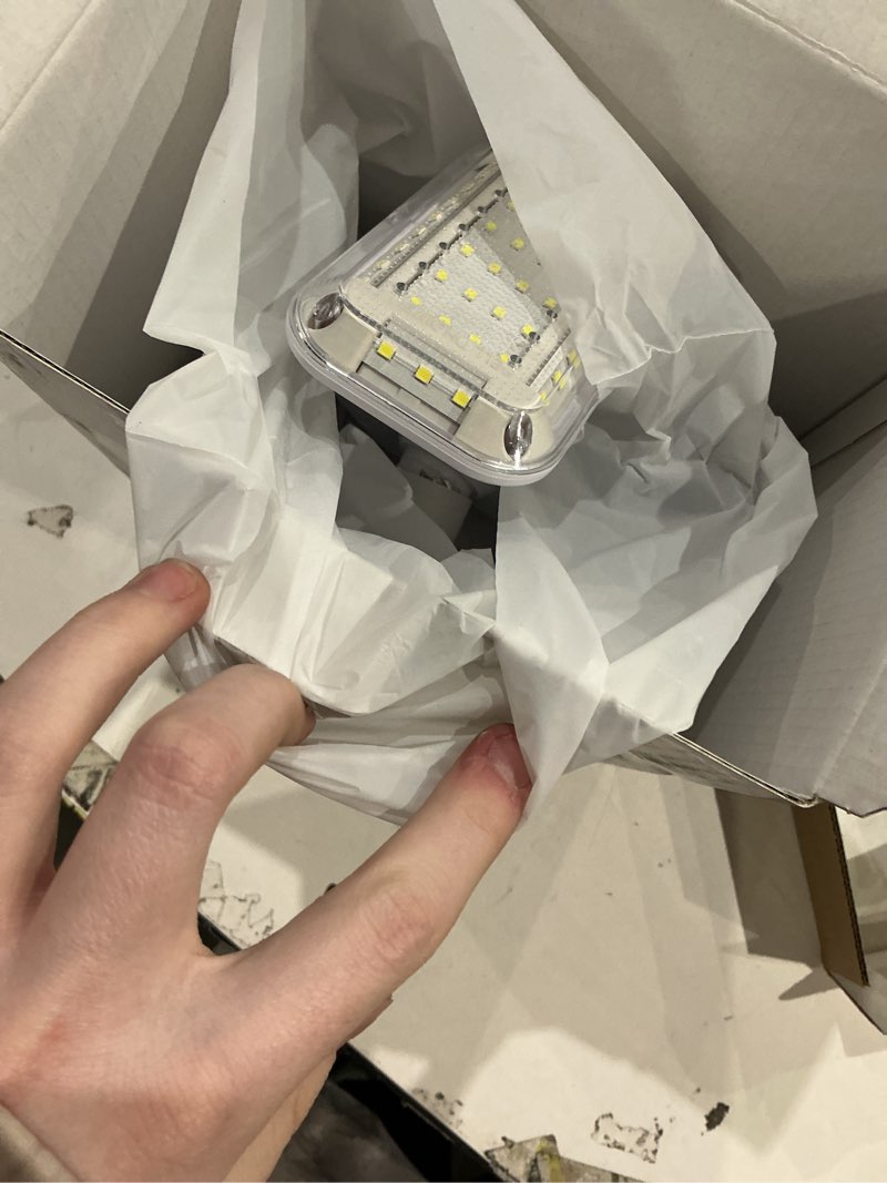 Condition photo showing As Is for triburst shoplight 2000 lumens | super bright led light with 3 adjustable panels | covers 2000 sq ft | 6500k color temp | easy install | energy saving | multi-directional for garage, basement or attic