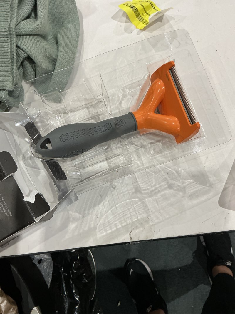 Condition photo showing Good Condition for furminator undercoat deshedding tool for pets - long hair - medium