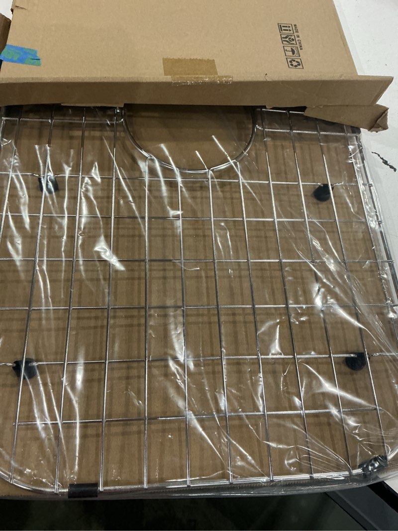 Condition photo showing Good Condition for serene valley sink protector grid 26-1/16" x 14-1/16", centered drain with corner radius 3-1/2", 304 stainless steel material nlw2614c