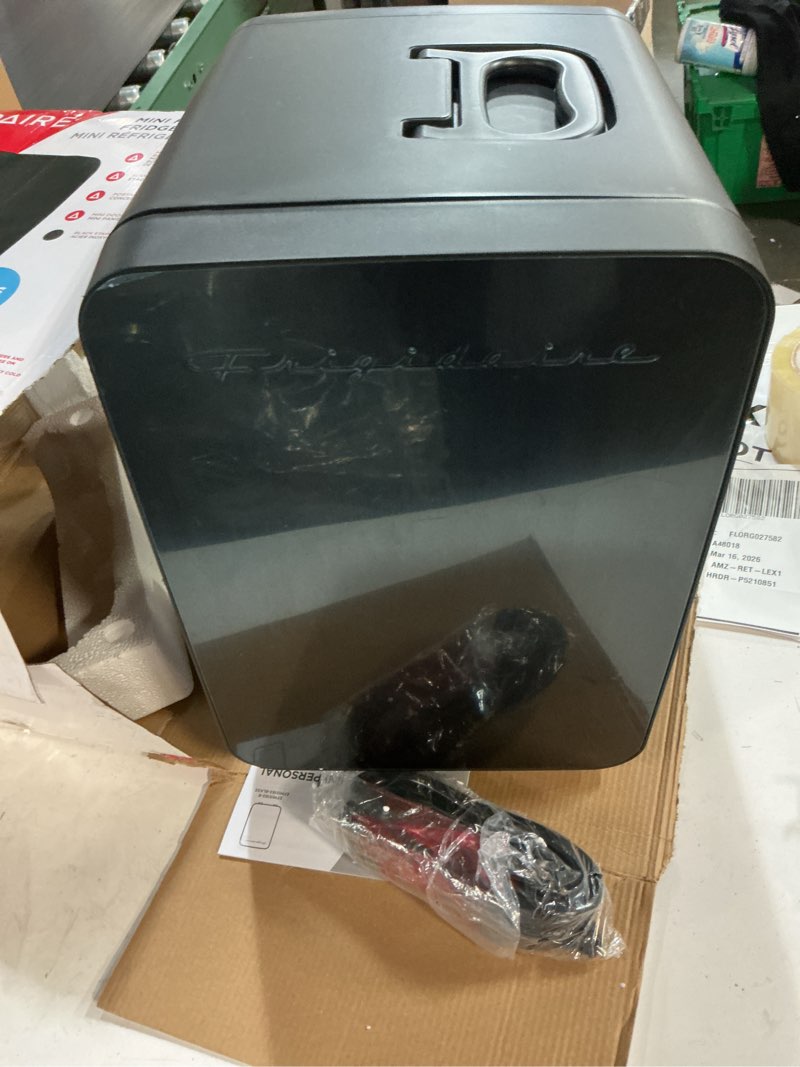 Condition photo showing Good Condition for Frigidaire Mini Personal Fridge Cooler, Countertop, Holds Up to 10L/15 Cans, Brushed Black Stainless Rugged Design, Portable for Skincare, Makeup, Car, Office, Bedroom, Dorm Room, or Cabin