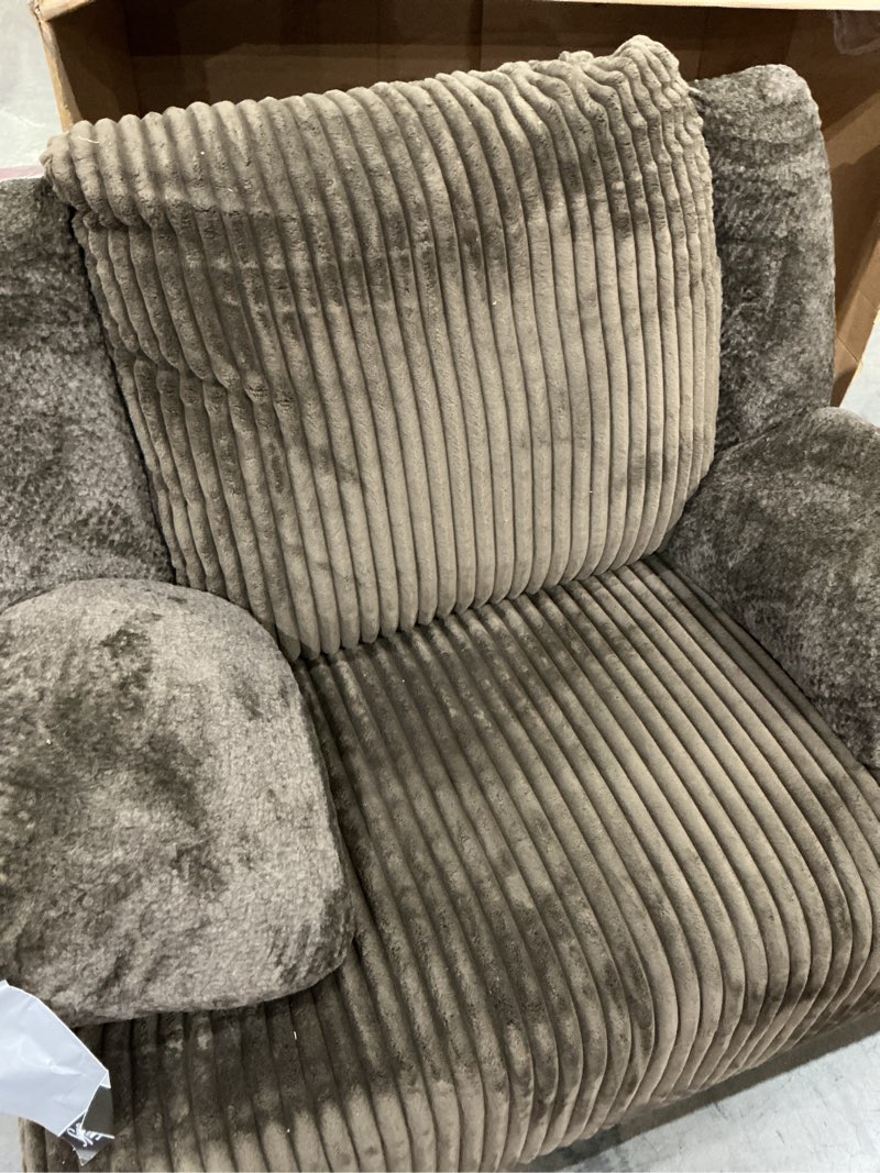 Condition photo showing Good Condition for item similar ))))signature design by ashley top tier rocker recliner, pull tab recliner, fabric upholstery, attached foam cushions, 50\" w x 40\" d x 41\" h, dark brown