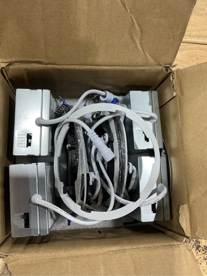 Condition photo showing As Is for ensenior 4 pack 4 inch led recessed light, dimmable, 2700k-5000k 5cct, 750lm high brightness, 9w 120v, damp rated, ultra-thin canless wafer light, black - etl & fcc & ic 2700/3000/3500/4000/5000k - 5cct black 4 inch