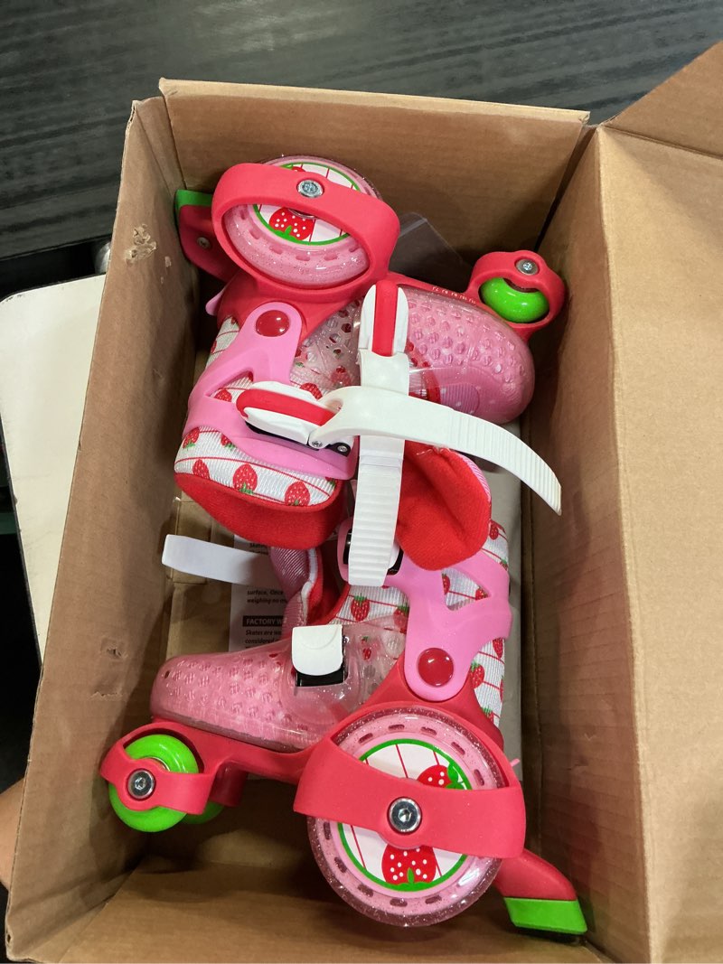 Condition photo showing Good Condition for (size 7-11)roller derby fun roll girls' jr adjustable roller skate strawberry
