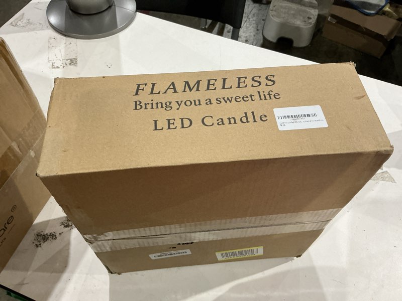 Condition photo showing New/Like New for 24 pack led gray flameless candles with remote, 3d flickering battery operated candles in glass holders, safe for weddings, parties, home and outdoor decor. grey-24pack