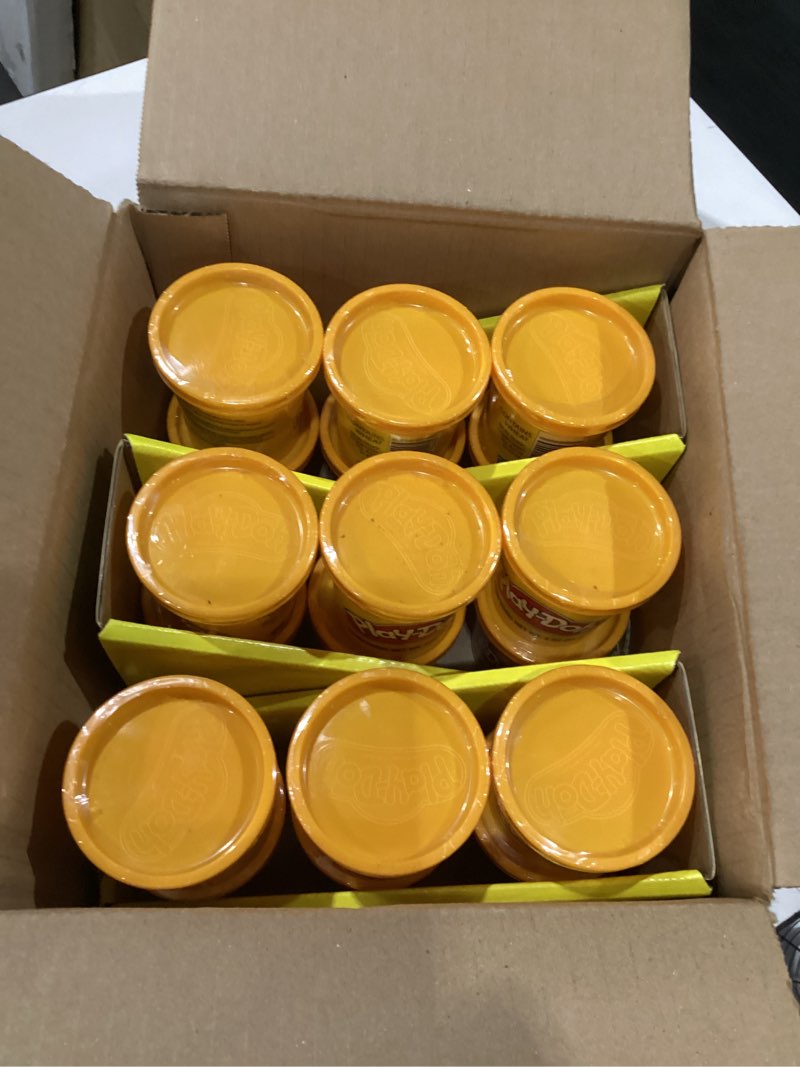 Condition photo showing New/Like New for playdoh (orange)