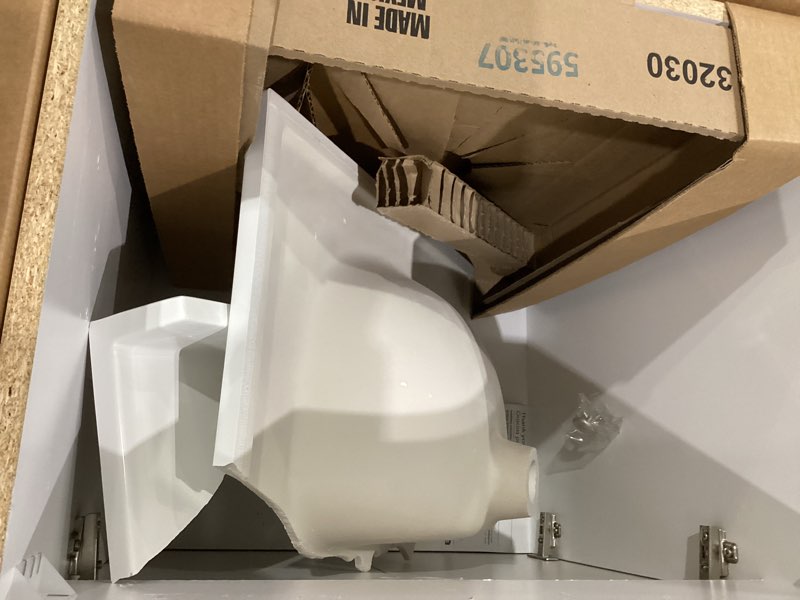 Condition photo showing As Is for project source dover 24-in true white single sink bathroom vanity with white cultured marble top (fully assembled) item #2694475 | model #r38 vbcu2418