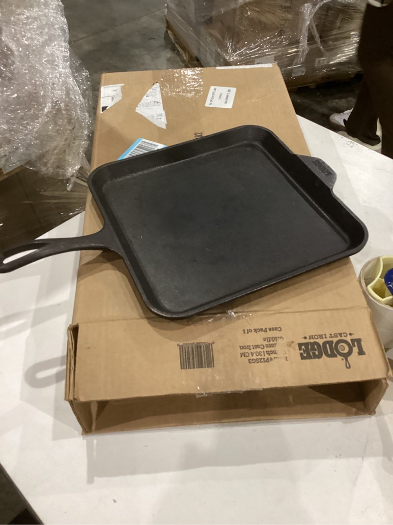 Condition photo showing New/Like New for lodge cast iron skillet with red silicone hot handle holder, 10.25-inch 10.25 inch + hot handle holder