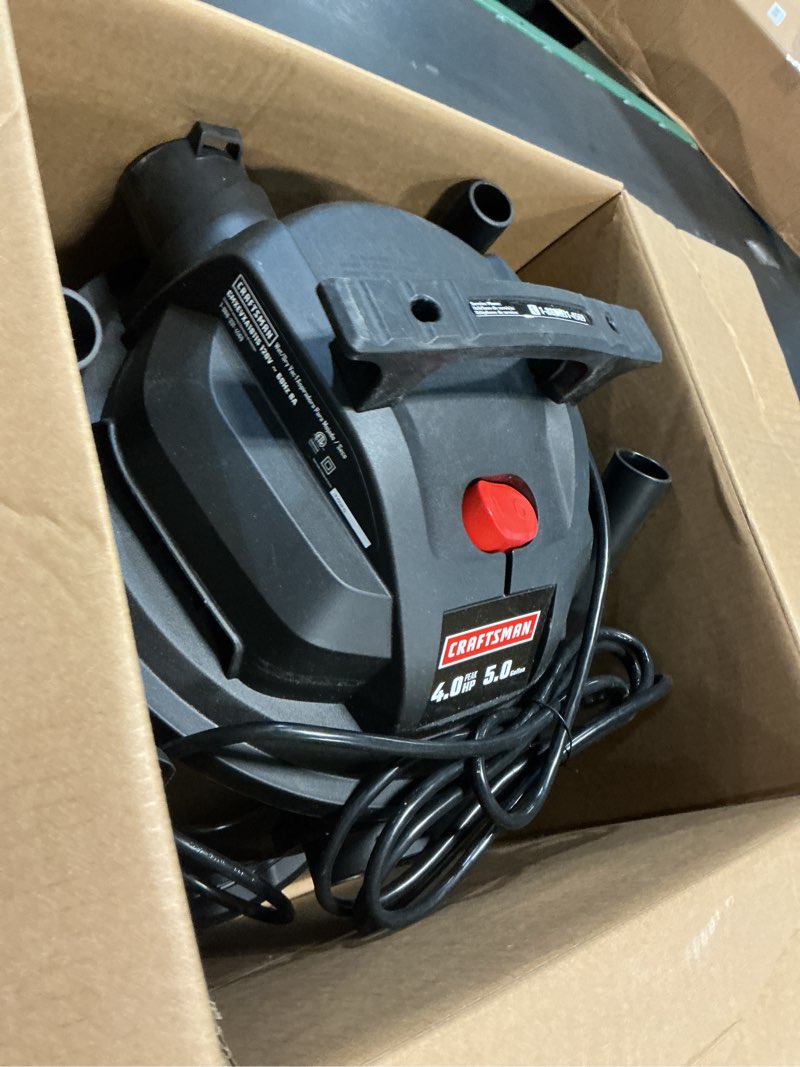 Condition photo showing As Is for craftsman 5-gallon 4-hp corded wet/dry shop vacuum with accessories included