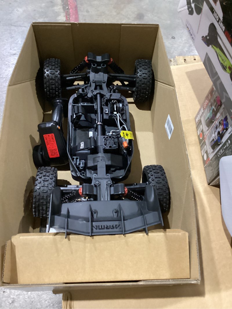 Condition photo showing As Is for ARRMA RC Car 1/8 Typhon 4X4 223S BLX BRUSHLESS Buggy RTR (Battery and Charger Not Included) with DSC RED/Blue, ARA4306V4T3