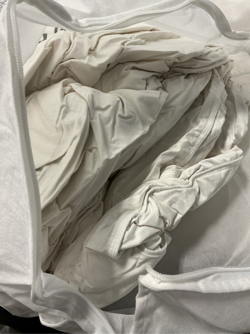 Condition photo showing As Is for ultra warm premium down comforter, twin, down
