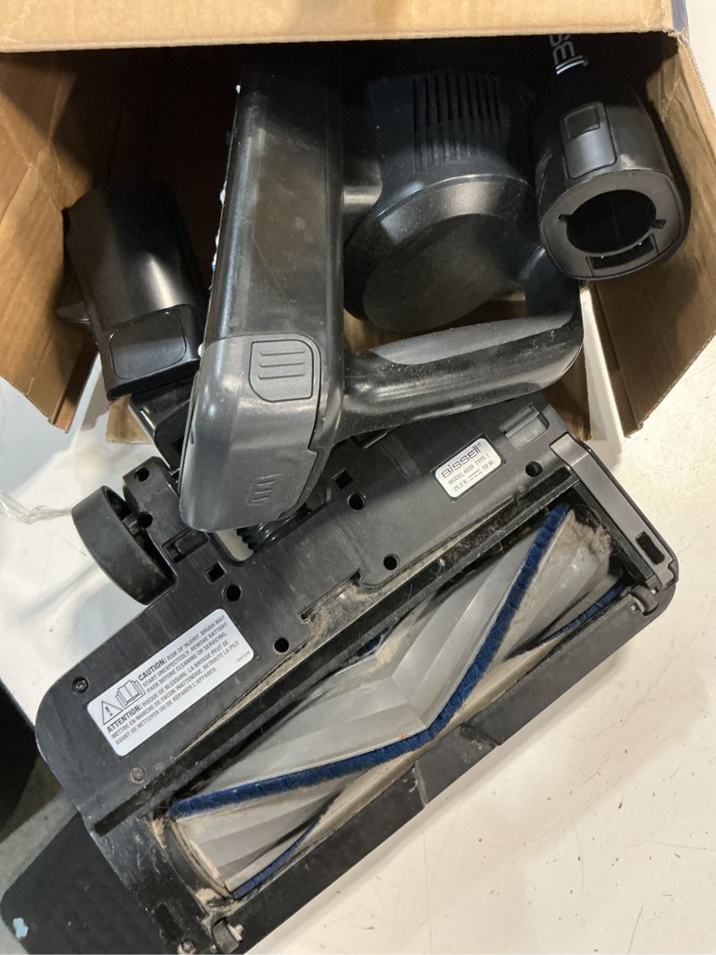 Condition photo showing As Is for bissell powerclean furguard 280w self-standing cordless vacuum w/self-cleaning brush roll, strong suction, removeable battery, wall mount, upholstery tool & bright headlights