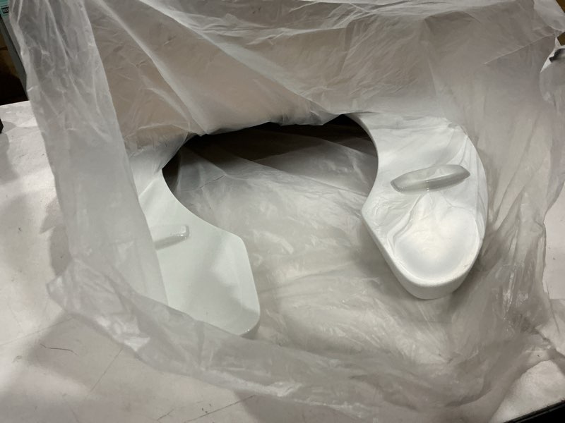 Condition photo showing As Is for bemis 955ct 000 commercial heavy duty open front toilet seat will never loosen & reduce call-backs, round, plastic, white