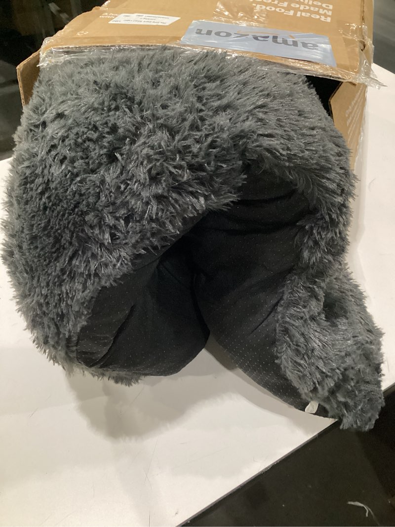 Condition photo showing As Is for fluffy dog crate bed, similar to stock photos, size unknown
