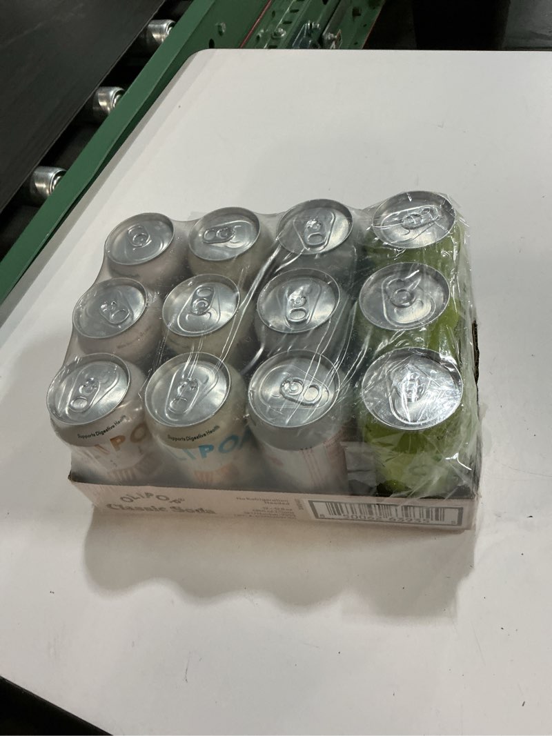 Condition photo showing New/Like New for (BB/03/17/2027) OLIPOP Prebiotic Soda Pop, Classic Soda Variety, Pantry Pack Packed with Prebiotics, Fiber, and Botanicals, Gluten Free, Vegan, GMO Free, 12oz (12-Cans)