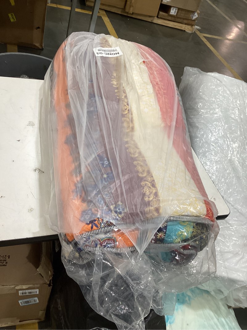 Condition photo showing Good Condition for this item appears to be a wrapped collection of apparel or home textiles, possibly featuring decorative patterns similar to those found on themed clothing or patterned blankets.