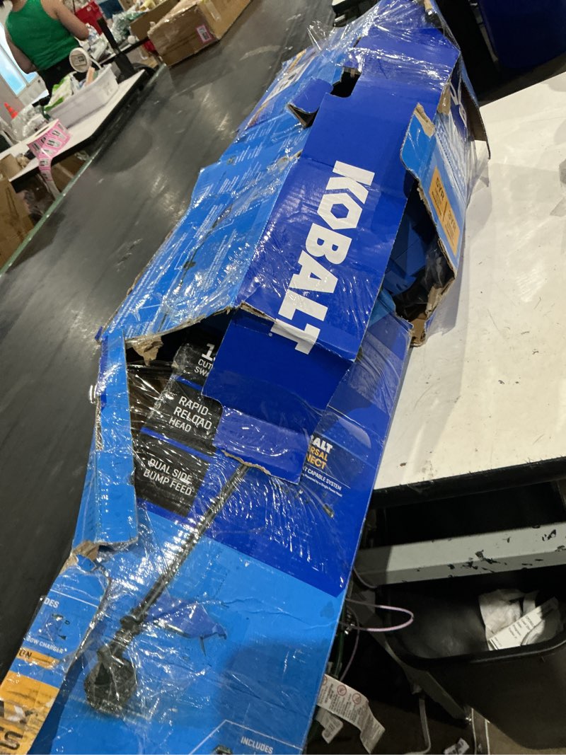 Condition photo showing As Is for kobalin straight shaft battery string trimmeah (battery included) (charger