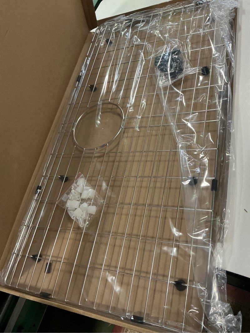 Condition photo showing Good Condition for 29.3 in. x 15.4 in. Rear Drain Kitchen Sink Bottom Grid with Supersoft Silicone Feet in 304 Grade Stainless Steel