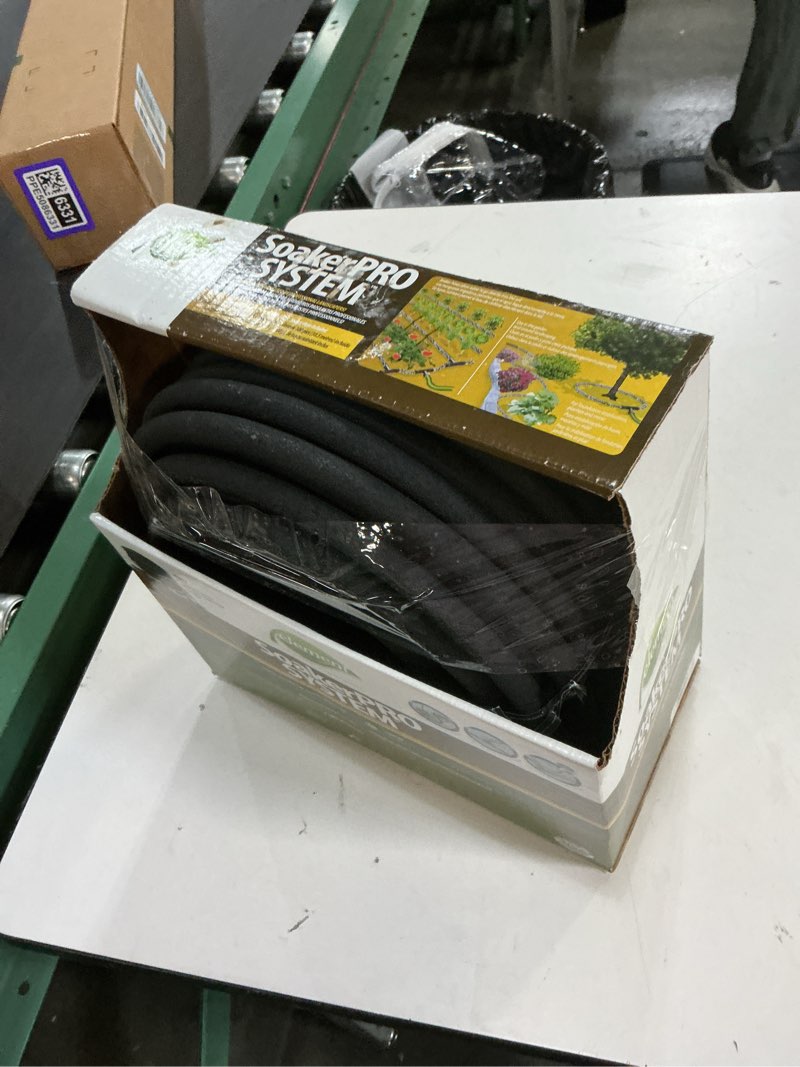 Condition photo showing As Is for swan soakerpro 3/8 in. x 100 ft. heavy duty soaker hose system