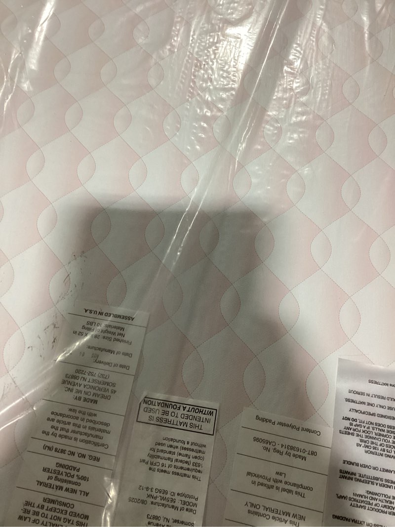 Condition photo showing New/Like New for Dream On Me 2 in 1 Little Lullaby Crib and Toddler Mattress Pink Wave