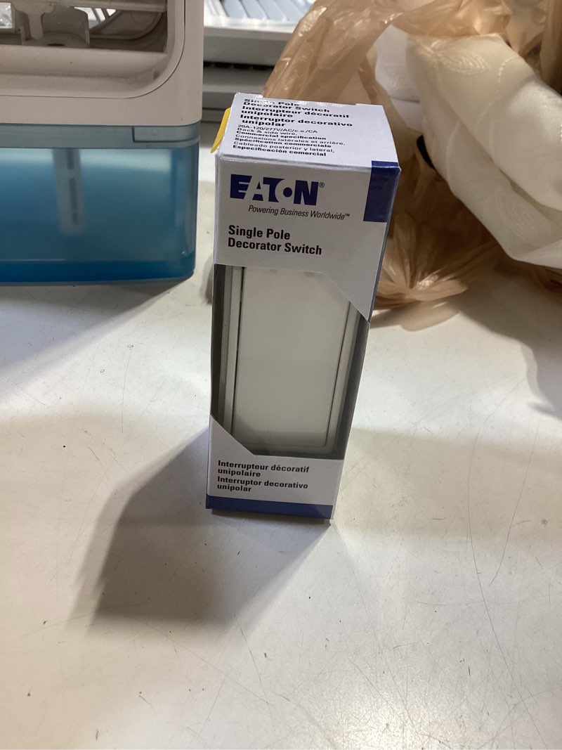 Condition photo showing Good Condition for eaton 20-amp single-pole rocker light switch, white