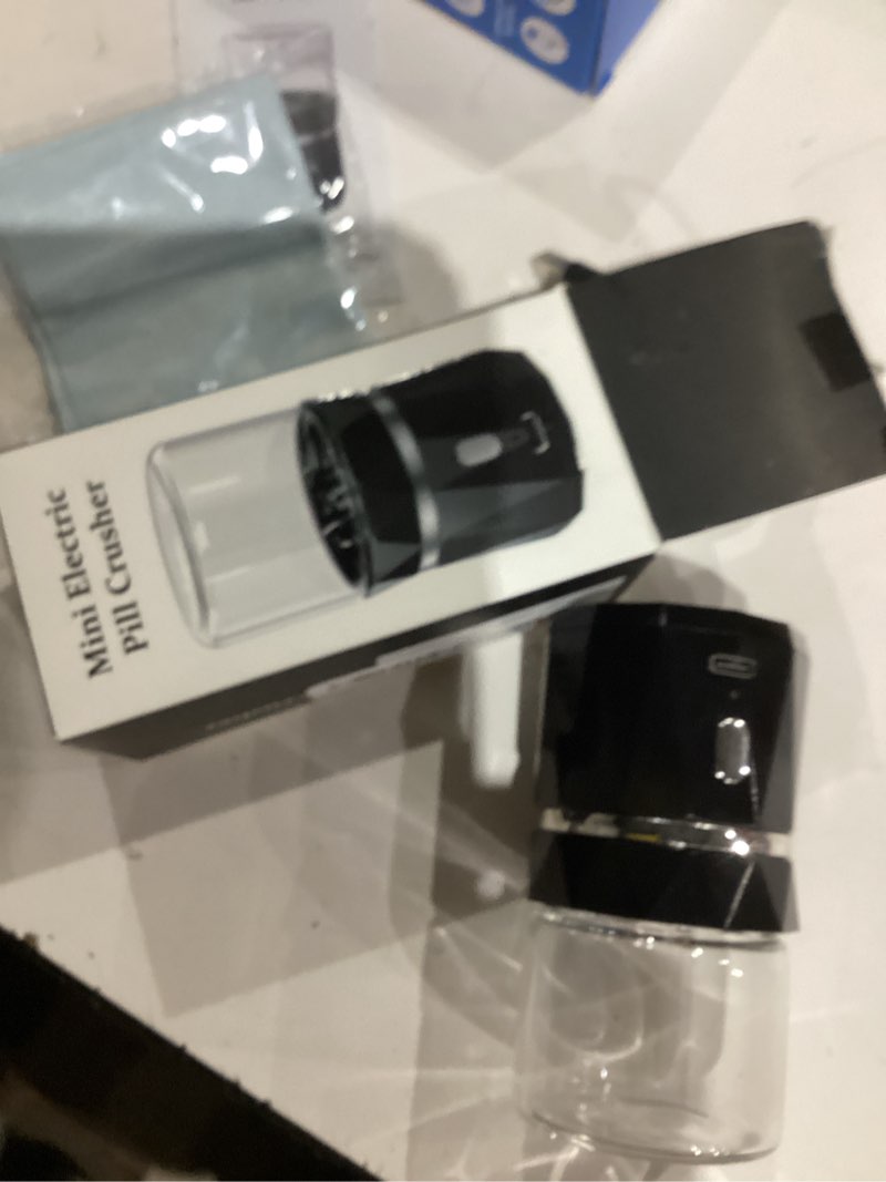 Condition photo showing As Is for small portable cordless electric pill crusher fine powder for elderly - battery operated pill grinder for multiple pills, small and large medication and vitamin tablets - suitable for travel (black)
