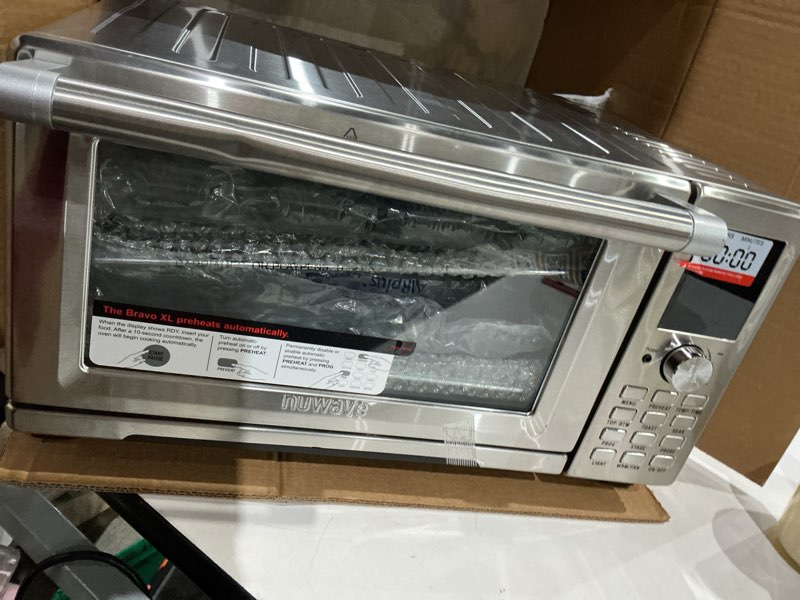 Condition photo showing As Is for nuwave bravo® xl air fryer and oven silver model: 20803 rev.02