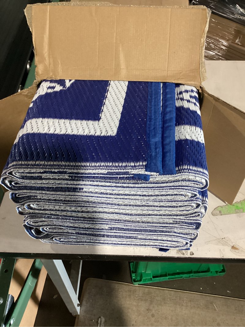 Condition photo showing Good Condition for 10 x20 reversible mats, plastic straw rug, modern area rug, large floor mat rug for outdoors, rv, patio, backyard, deck, picnic, beach, trailer, camping, dark blue & white