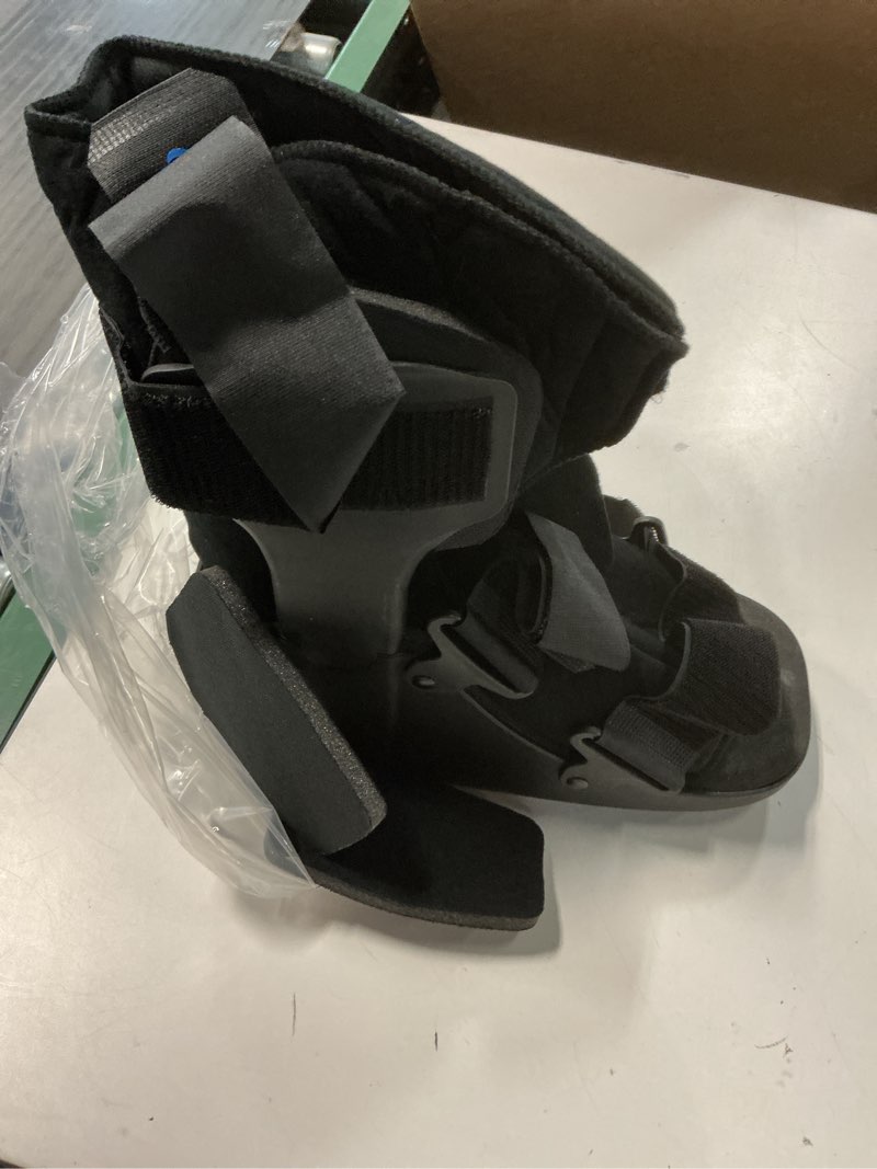 Condition photo showing As Is for United Ortho USA14015 Short Cam Walker Fracture Boot, Medium, Black Medium Shoe Black