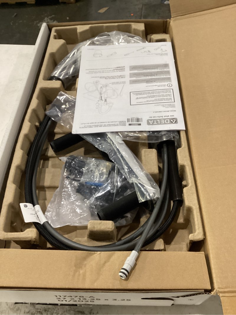 Condition photo showing As Is for delta essa brushed nickel kitchen faucet with pull down sprayer, modern single hole kitchen sink faucet, single handle, arctic stainless 9113-ar-dst