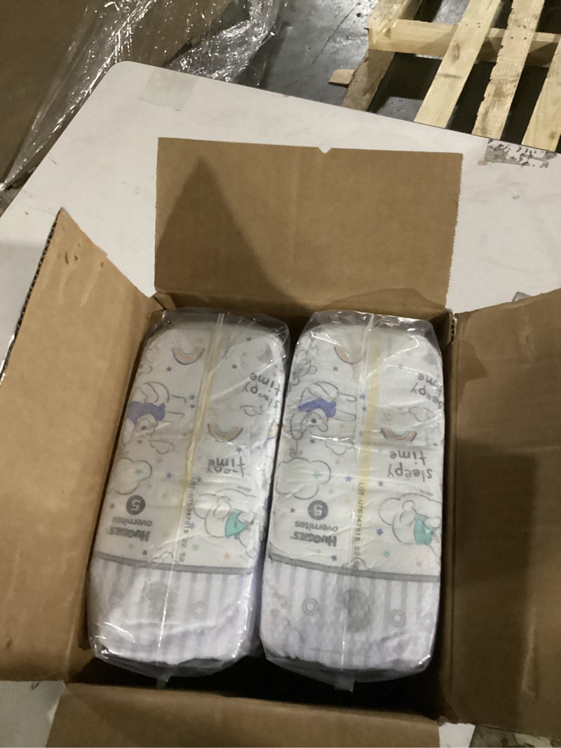 Condition photo showing Good Condition for huggies overnites size 5 overnight diapers (27+ lbs), 50 ct, packaging may vary size 5 50