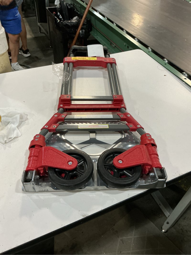 Condition photo showing New/Like New for milwaukee 73777 fold up hand truck, no size, red, 5 count
