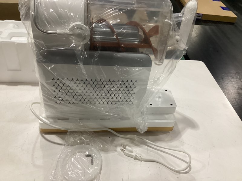 Condition photo showing New/Like New for **untested** slushie machine for home,frozen drink and slushy maker,240w fast make slushy 5-10 minutes,no ice needed, 6 preset programs slushie maker with auto clean,frozen margaritas, frappés, milkshake(white)