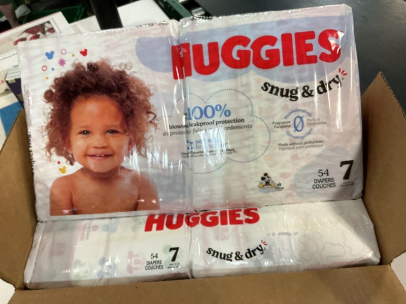 Condition photo showing New/Like New for huggies snug & dry disposable diapers - econ+ pack - size 7 - 108ct