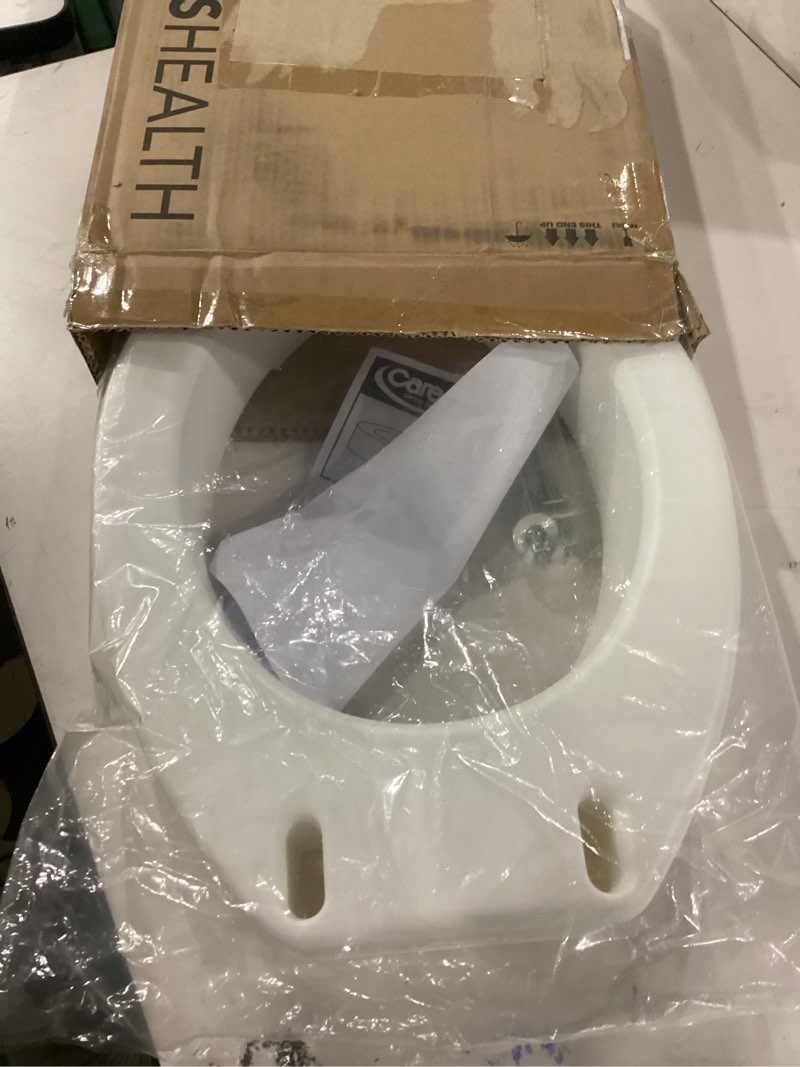 Condition photo showing As Is for carex toilet seat riser, elongated raised toilet seat adds 3.5 inches to toilet height, for assistance bending or sitting, 300 pound weight capacity toilet riser