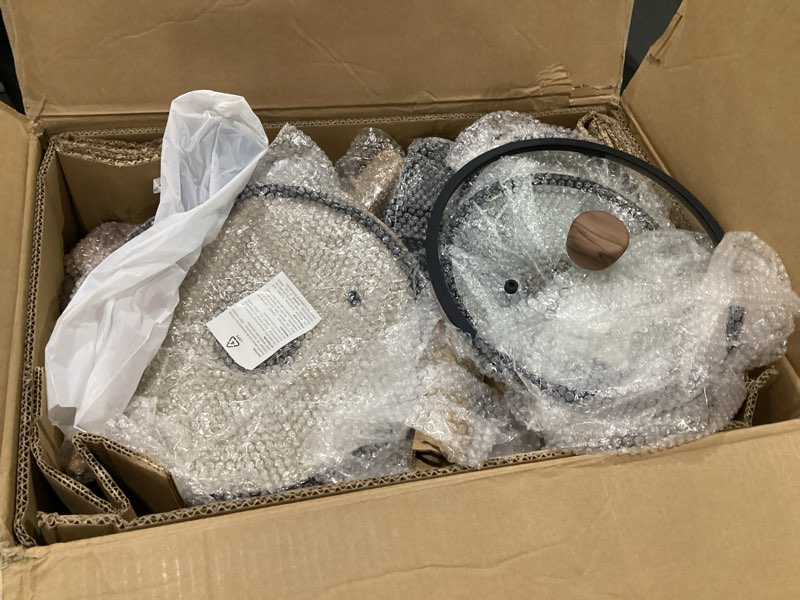 Condition photo showing As Is for CAROTE 24Pcs Nonstick Kitchen Cookware Sets, Non stick Pots and Pans set, Induction Cookware Set Black Black 24 PCS