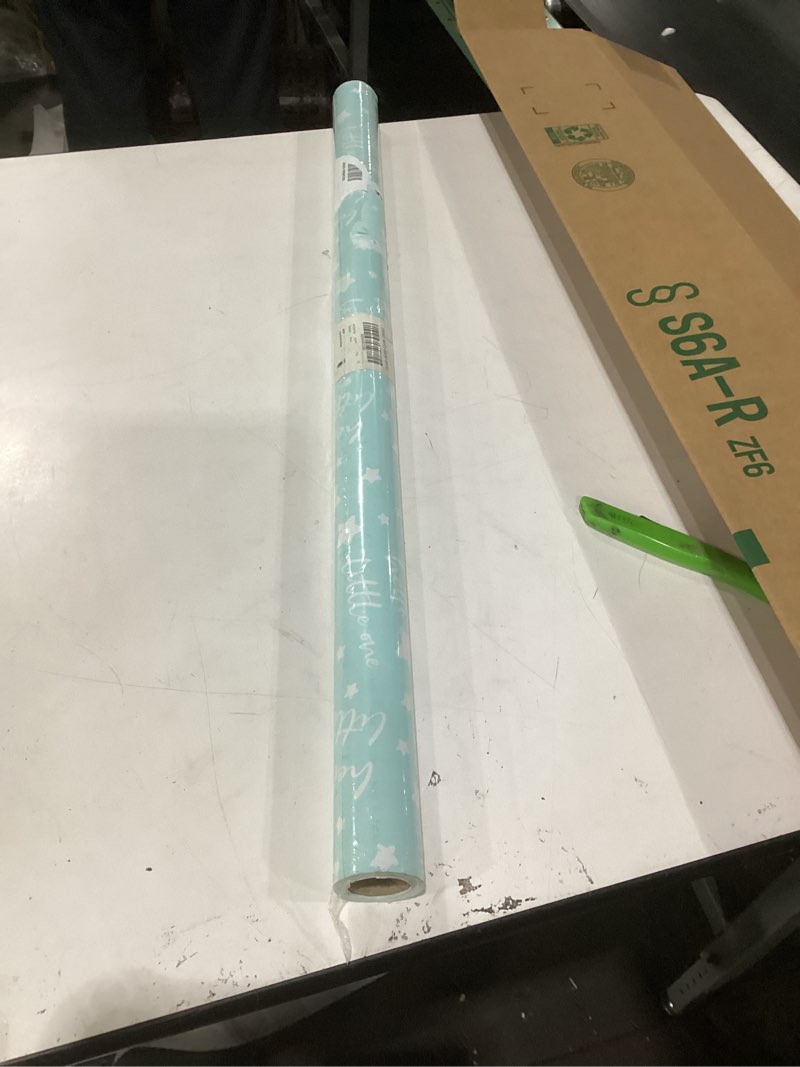 Condition photo showing As Is for similat to stock photo ruspepa reversible wrapping paper roll, jumbo roll, baby boy blue and plaid pattern for baby boy or neutral gift wrapping, kids' birthday party and baby shower wrap paper, 30 inches x 32.8 feet baby boy 30 in x 32.8 ft