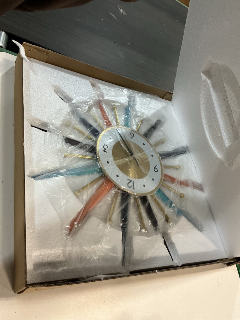 Condition photo showing New/Like New for starburst large wall clock metal decorative,mid century wall clocks, silent non-ticking battery operated wall clocks home décor for living room,bedroom,dining room, office, 22 inch
