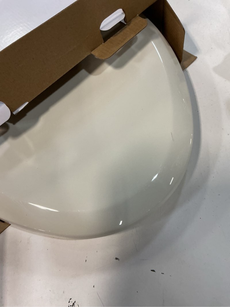 Condition photo showing As Is for Gerber Elongated Toilet Seat with Cover, Soft Close, No Slam, Quick & Easy Install, Heavy-Duty Plastic, Adjustable Fit for Standard Elongated Toilets, Durable & Fade-Resistant, Biscuit G009921309