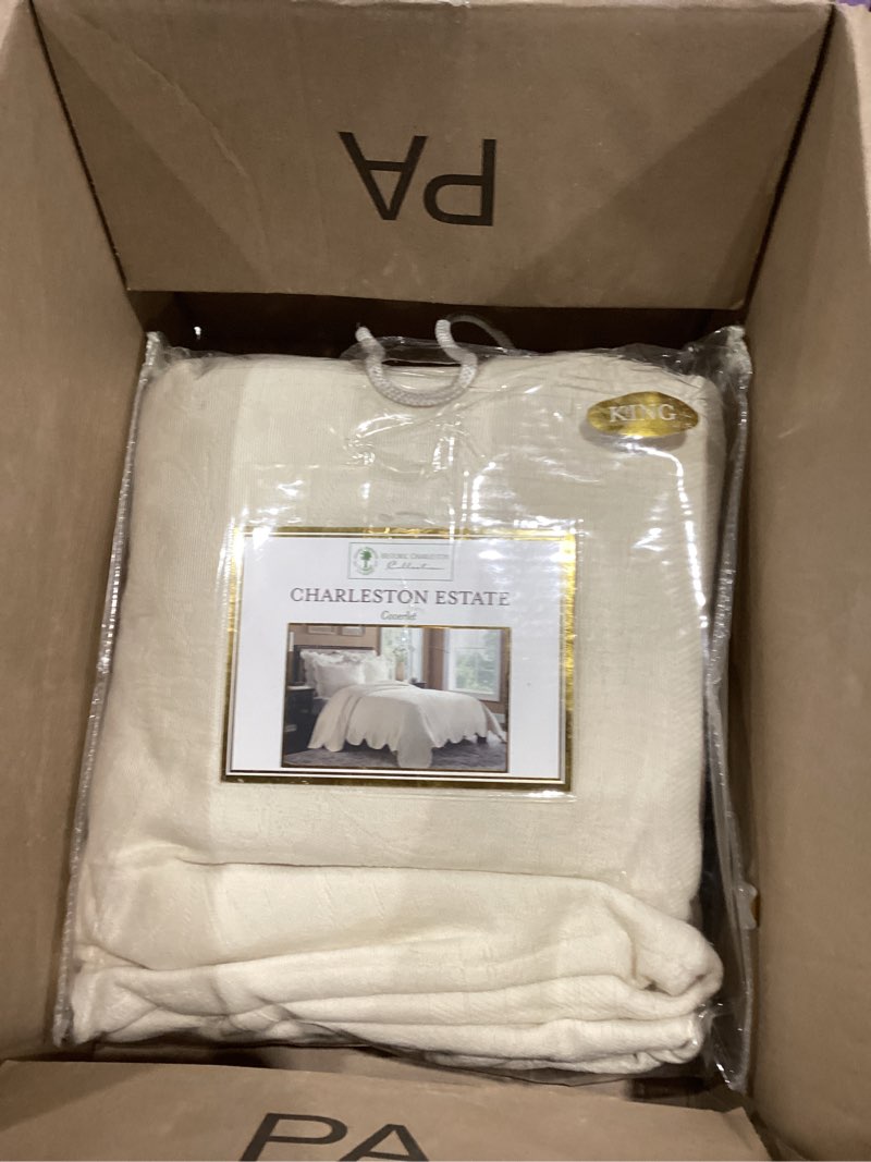 Condition photo showing As Is for charleston estate modern farmhouse floral matelasse bedspread with scalloped edges, 100% cotton breathable bedding, king/cal king, ivory floral bedspread ivory floral king/cal king