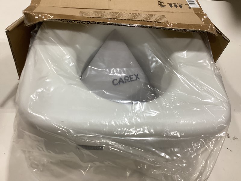 Condition photo showing Good Condition for carex toilet seat riser, adds 5 inches of height, elevated and raised toilet seat with 300 lbs capacity, standard riser for elderly and handicap, universal, slip-resistant, white 5 inch (pack of 1) toilet seat riser