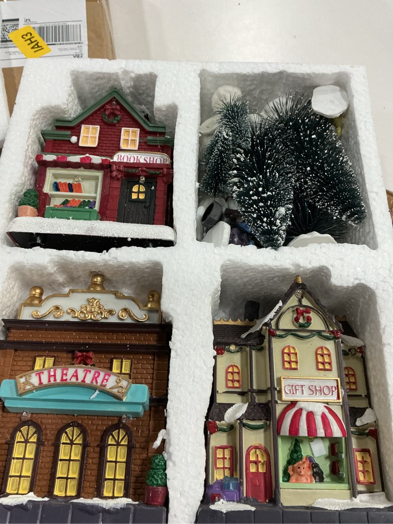 Condition photo showing item condition for Valery Madelyn Pre-Lit Christmas Village Set House Decoration, Battery Operated Christmas Figurine Accessories Town Building Collection for Holiday Xmas DIY Tabletop (17 PCS)