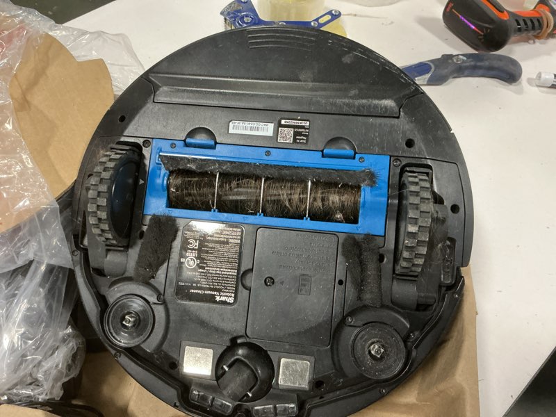 Condition photo showing As Is for Shark AV753 ION Robot Vacuum, Tri-Brush System, Wifi Connected, 120 Min Runtime, Works with Alexa, Multi Surface Cleaning, Grey ION Robot (Grey)